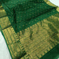 Close-up of Emerald Green Chanderi Katan Silk saree border showing fine gold-toned zari with floral and foliate patterning