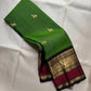 Emerald Green pure silk Kancheepuram saree, Butta weave with Deep Aubergine border — full drape view