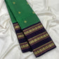 Emerald Green Kanchipuram silk body with small spaced gold zari buttas.