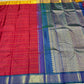 Emerald green and mustard gold Veldhari lines on red Kanjivaram silk
