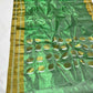 Handwoven jade green tissue silk saree with metallic sheen