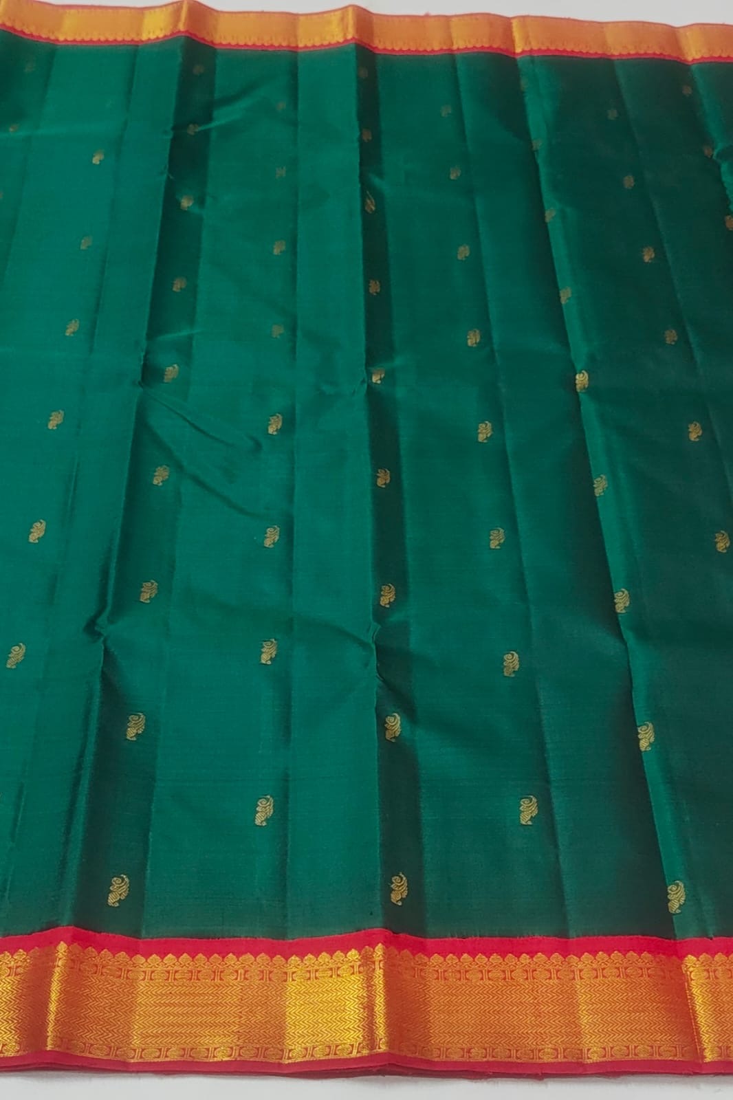 Emerald Green Handwoven Pure Silk Kancheepuram Saree with Vermilion Red Korvai Border