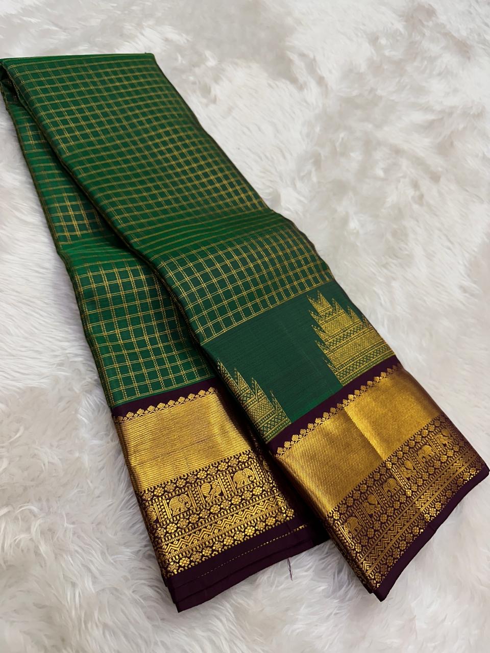 Emerald green Kancheepuram silk saree with purple double border and tree motif — Idam Living