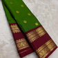Emerald green Kanchipattu silk saree with ruby rettapet border and gold zari Idam Living