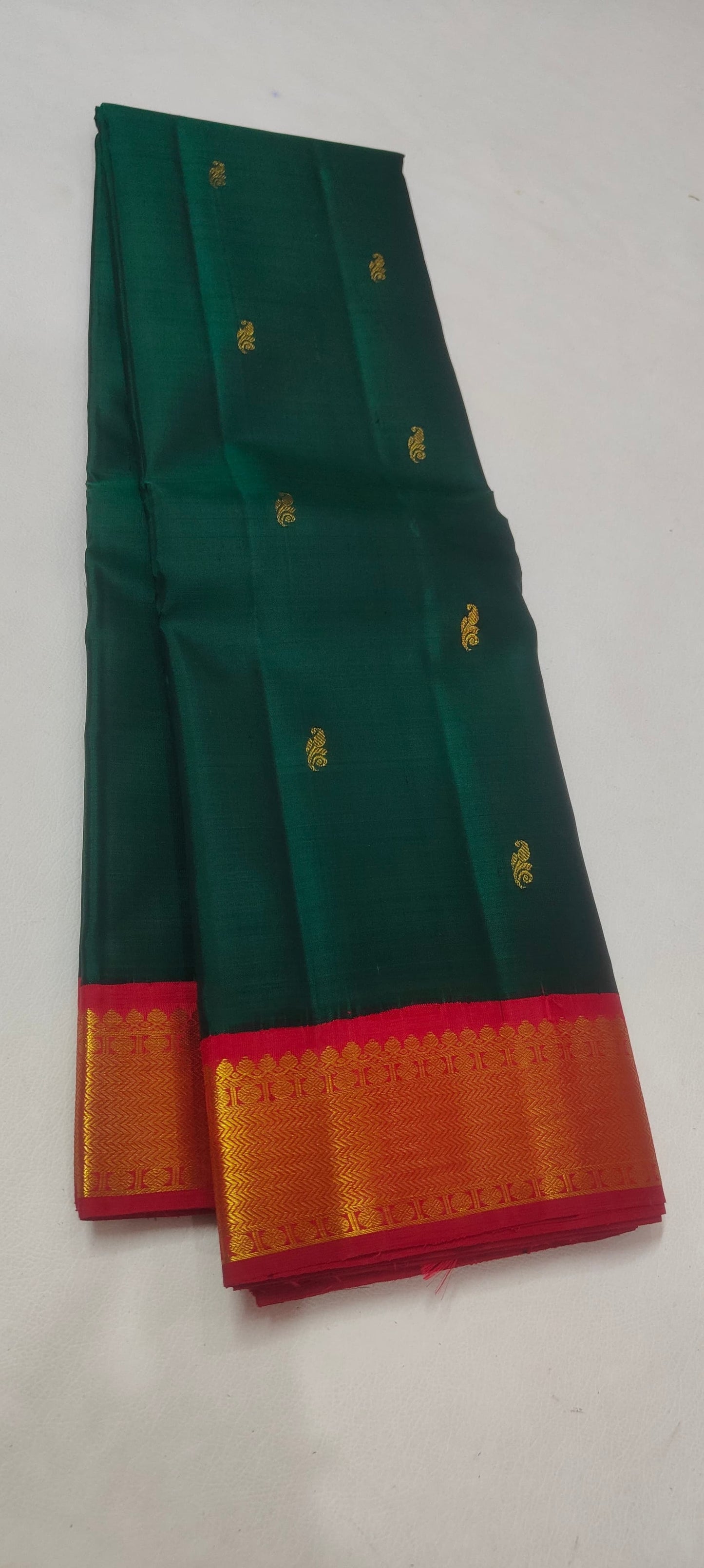 Emerald Green Handwoven Pure Silk Kancheepuram Saree with Vermilion Red Korvai Border