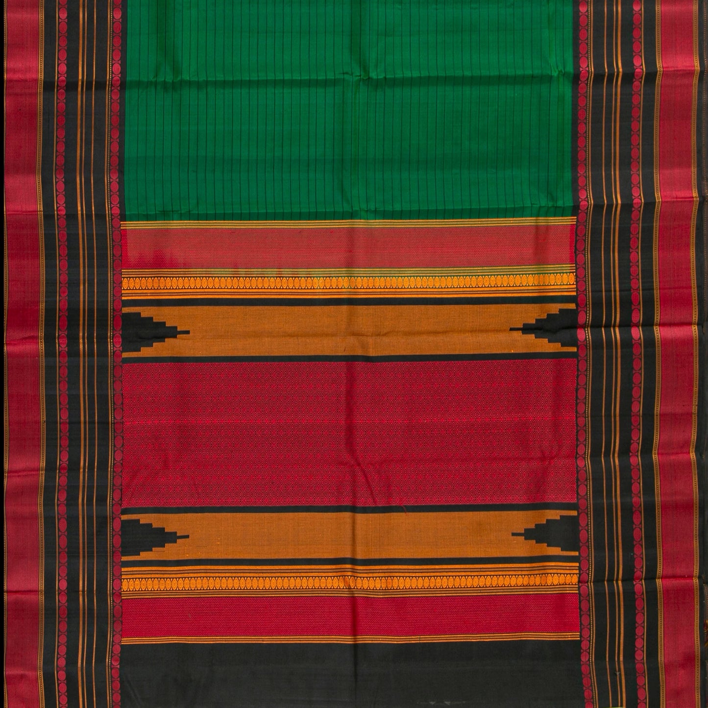 Kaal irangiya temple arch motifs on multi-colour pattupet border of emerald green Kanchipuram saree — Idam Living