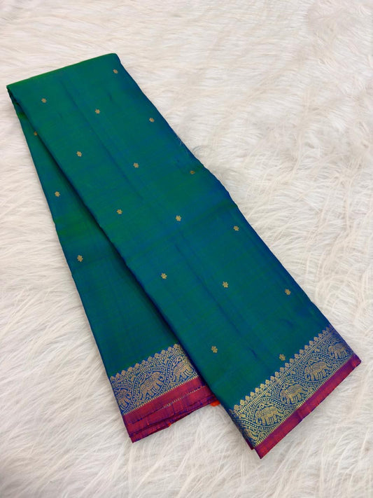 Peacock Blue Handwoven Pure Silk KanchiPattu Saree with Small Gold Buttas & Petite Zari Elephant Border