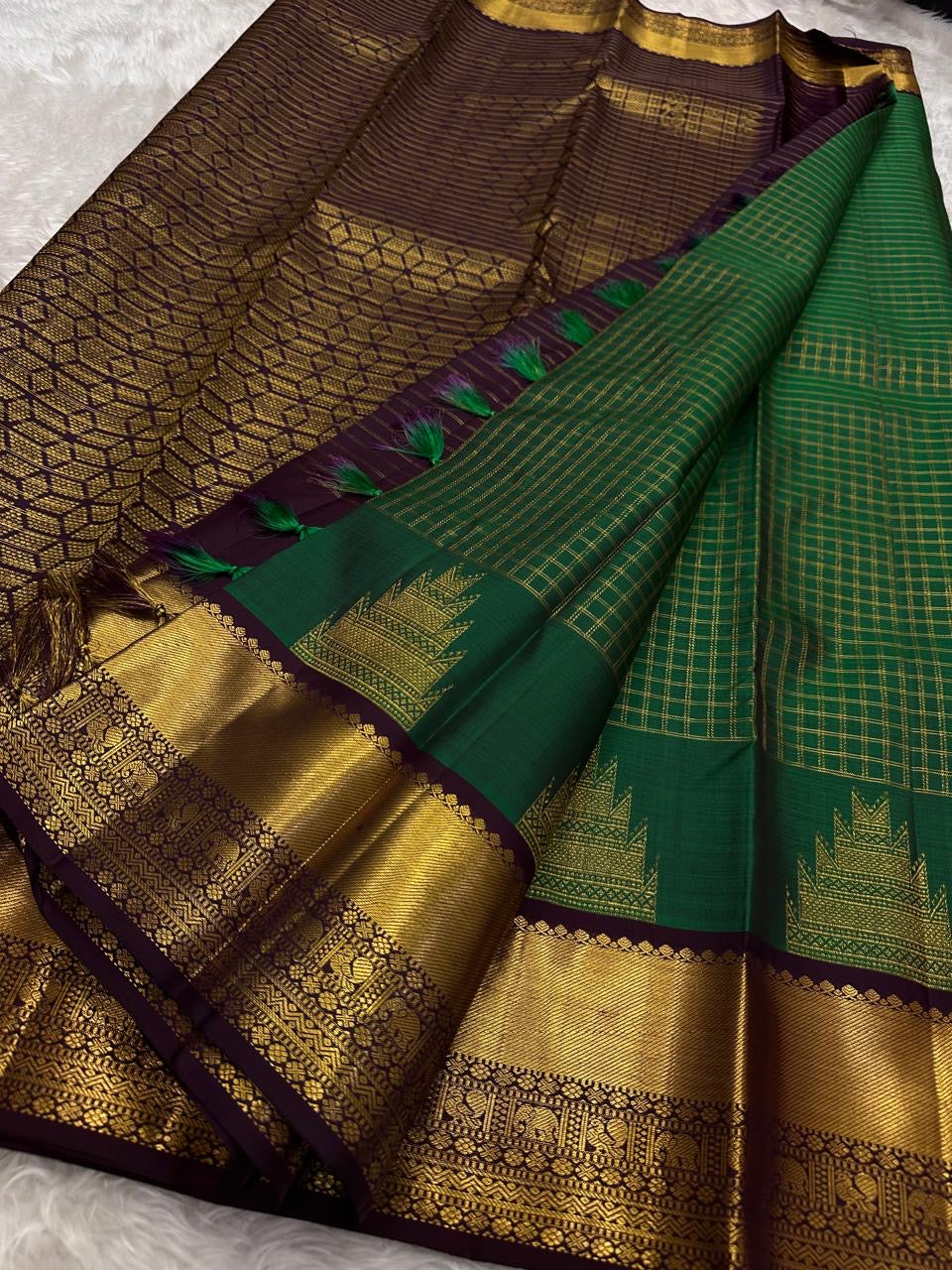 Emerald green Kanchipuram silk saree with Zari Kattam weave and purple Thazhampoo Reku border — Idam Living