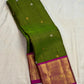Emerald olive green Kanchipuram pure silk saree with Zari Kattam and Sona Rupa buttas
