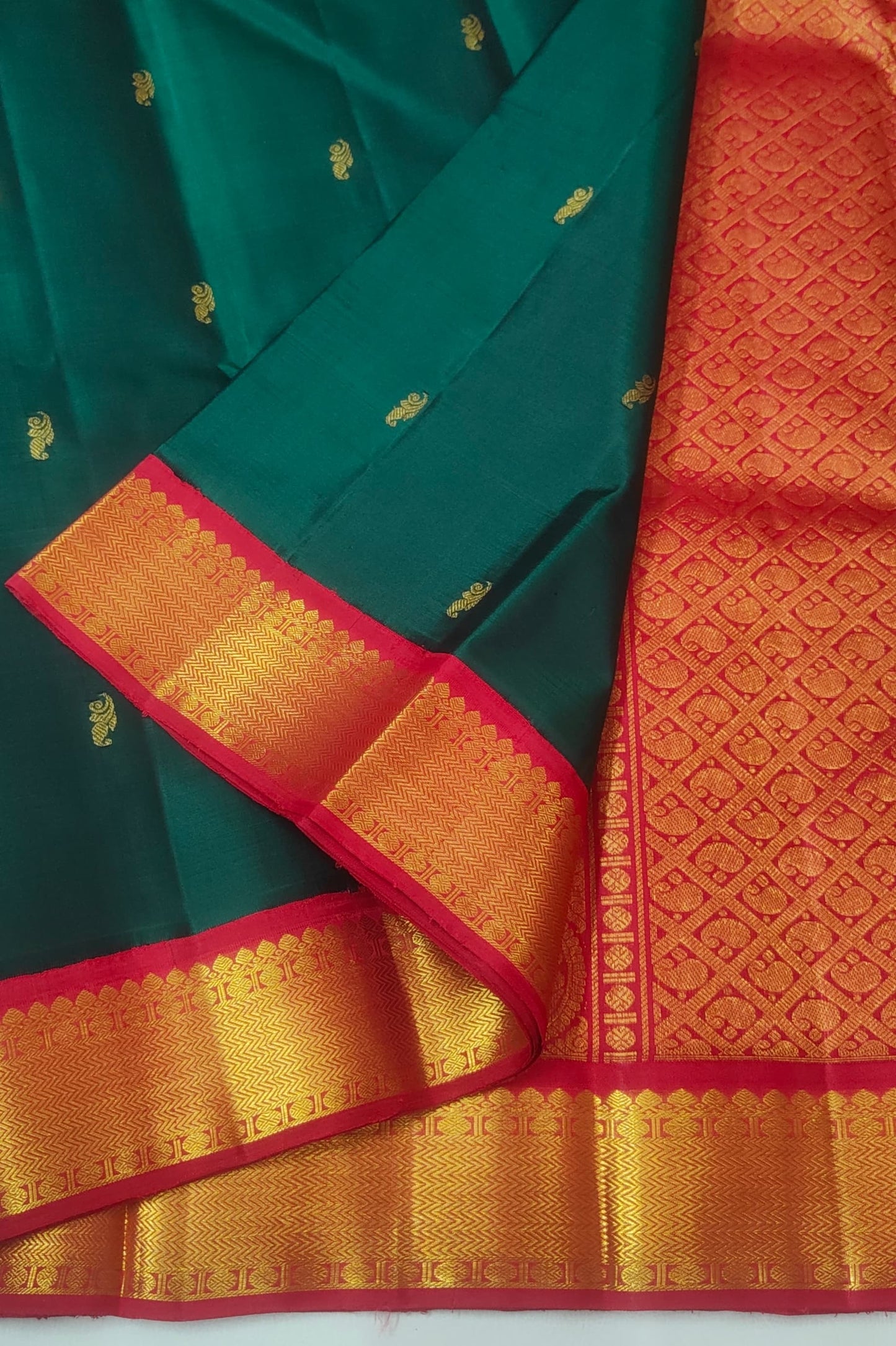 Emerald Green Handwoven Pure Silk Kancheepuram Saree with Vermilion Red Korvai Border