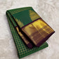 Emerald green Kanjeevaram saree with Zari Kattam weave and deep purple Thazhampoo Reku border — Idam Living