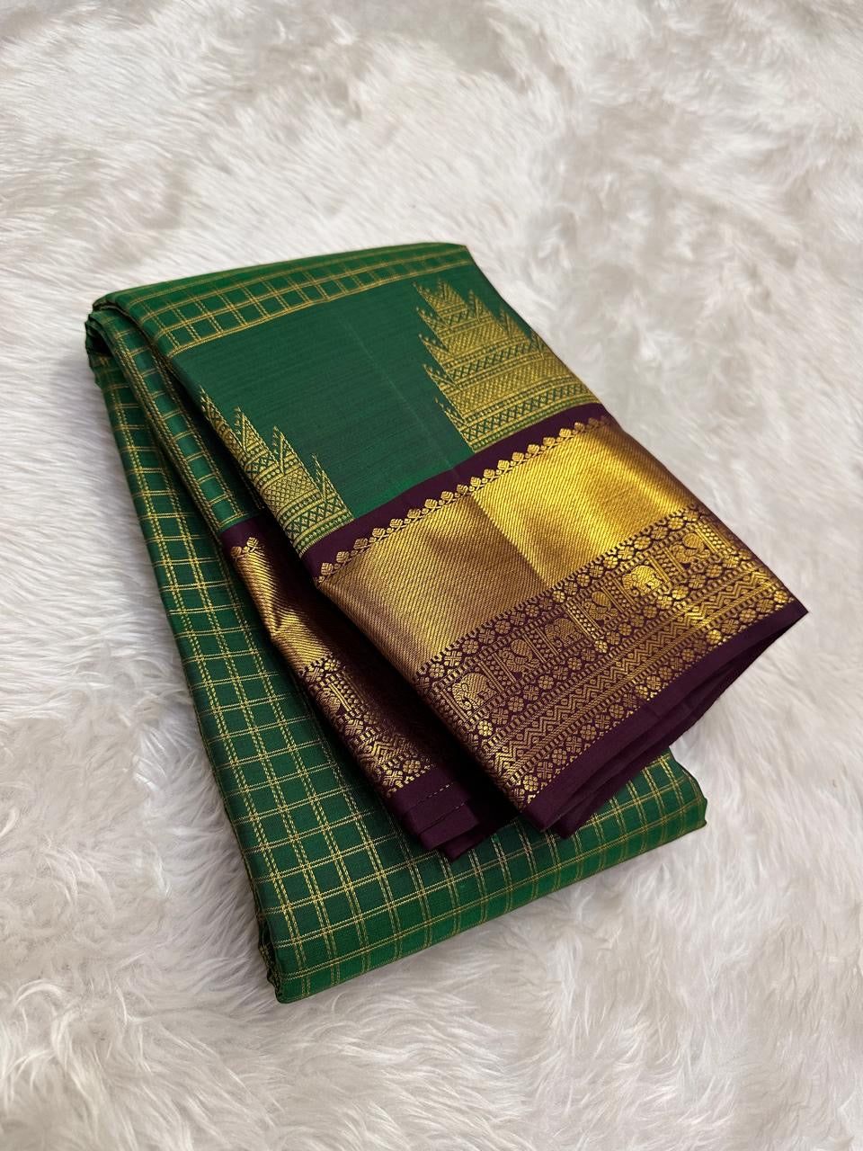 Emerald green Kanjeevaram saree with Zari Kattam weave and deep purple Thazhampoo Reku border — Idam Living