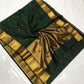 Deep Emerald Green Katan Silk Chanderi saree with scattered gold floral buttas, broad antique-gold border and woven gold pallu.