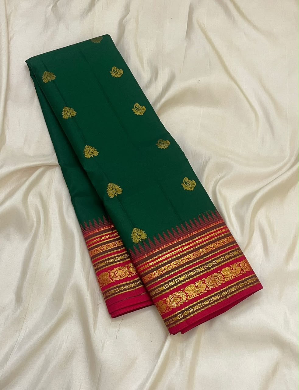 Emerald Green Pure Silk Kanchipuram Korvai saree with Arakku Red Mayil zari border