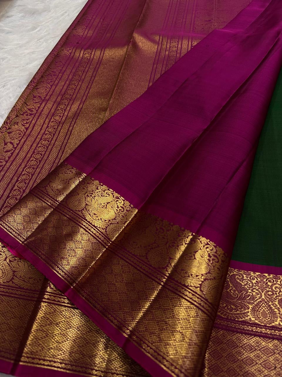Emerald Green Handwoven Pure Silk Kanjeevaram Saree with Raspberry Pink Mayil Korvai Border