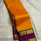 Handwoven Turmeric Yellow Kanjivaram saree with Emerald Green pallu