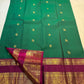 Emerald Pachai Green and Rani Pink handwoven pure silk Korvai saree by Idam Living.