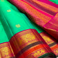 Emerald Aqua Green Shot-Colour Handwoven Pure Silk Kanchi Pattu Korvai Saree with Gold Zari Buttas and Raspberry Pink Pallu