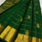 Deep emerald green pure silk Kanchipuram saree with gold Zari Kattam checks, handwoven Gandaberunda motifs and broad antique gold zari border.