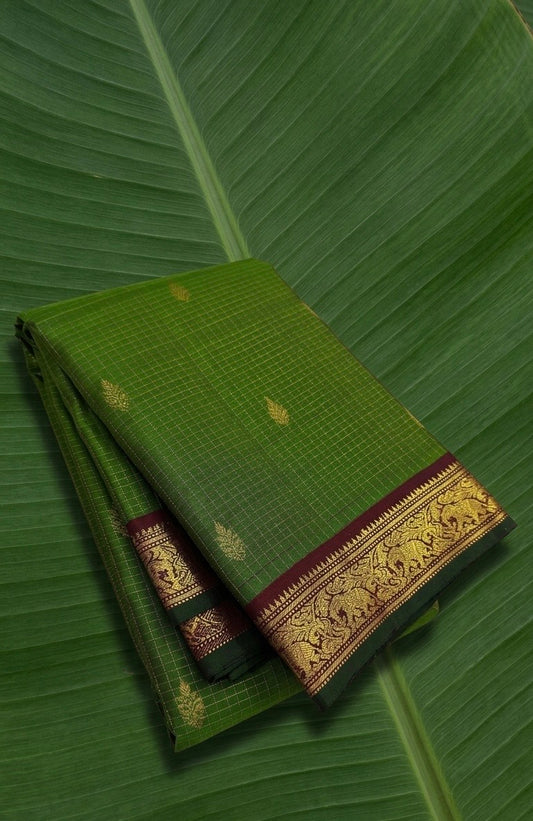 Emerald leaf Kanchipuram silk saree with antique gold zari kattam and maroon border