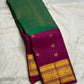 Emerald Pachai Green pure silk Kanjeevaram Korvai saree with Rani Pink gold zari border.