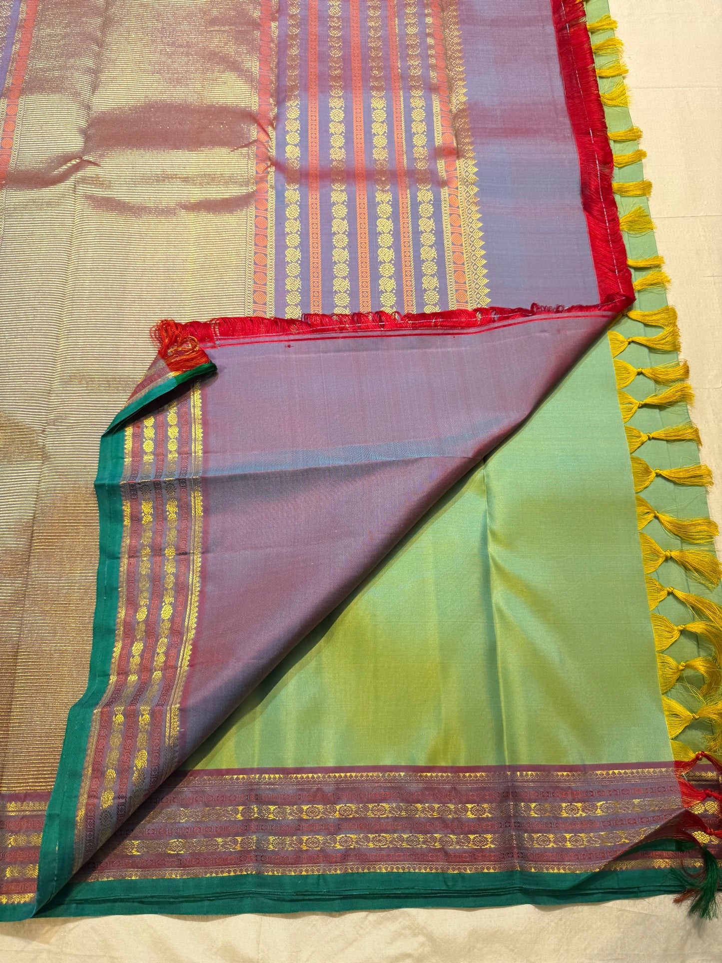 Emerald and Parrot Green Shot Colour Handwoven Pure Silk Kanchi Pattu Saree with Mayil Chakram Butta and Korvai Border