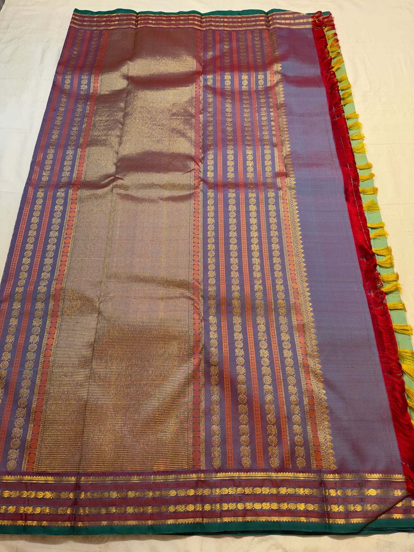 Emerald and Parrot Green Shot Colour Handwoven Pure Silk Kanchi Pattu Saree with Mayil Chakram Butta and Korvai Border