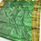 Small gold-toned motifs on jade green tissue silk