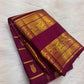 Ennai Arakku Kanchipuram mundhanai with dense geometric gold zari lattice and longitudinal Reku bands.