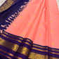 Erattai Kili and Kamalam lotus buttas in gold zari, coral-pink Kanjeevaram saree