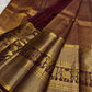 Exclusive Zari Kattam Kanjivaram saree with dense antique-gold weaving and elephant motifs.