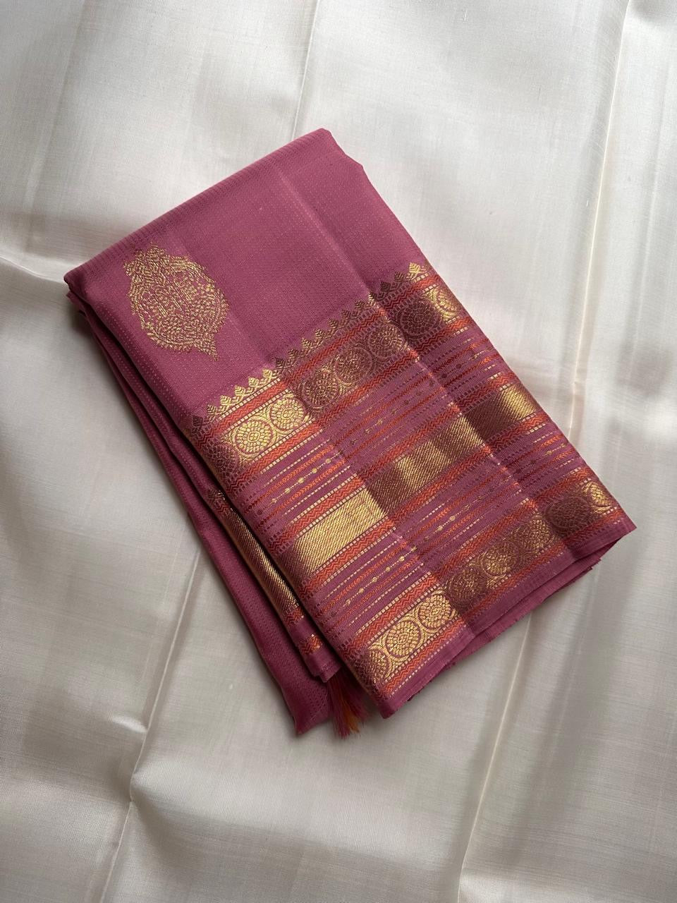Artisan handwoven orchid pink Kanchi Pattu silk saree with exclusive zari motifs
