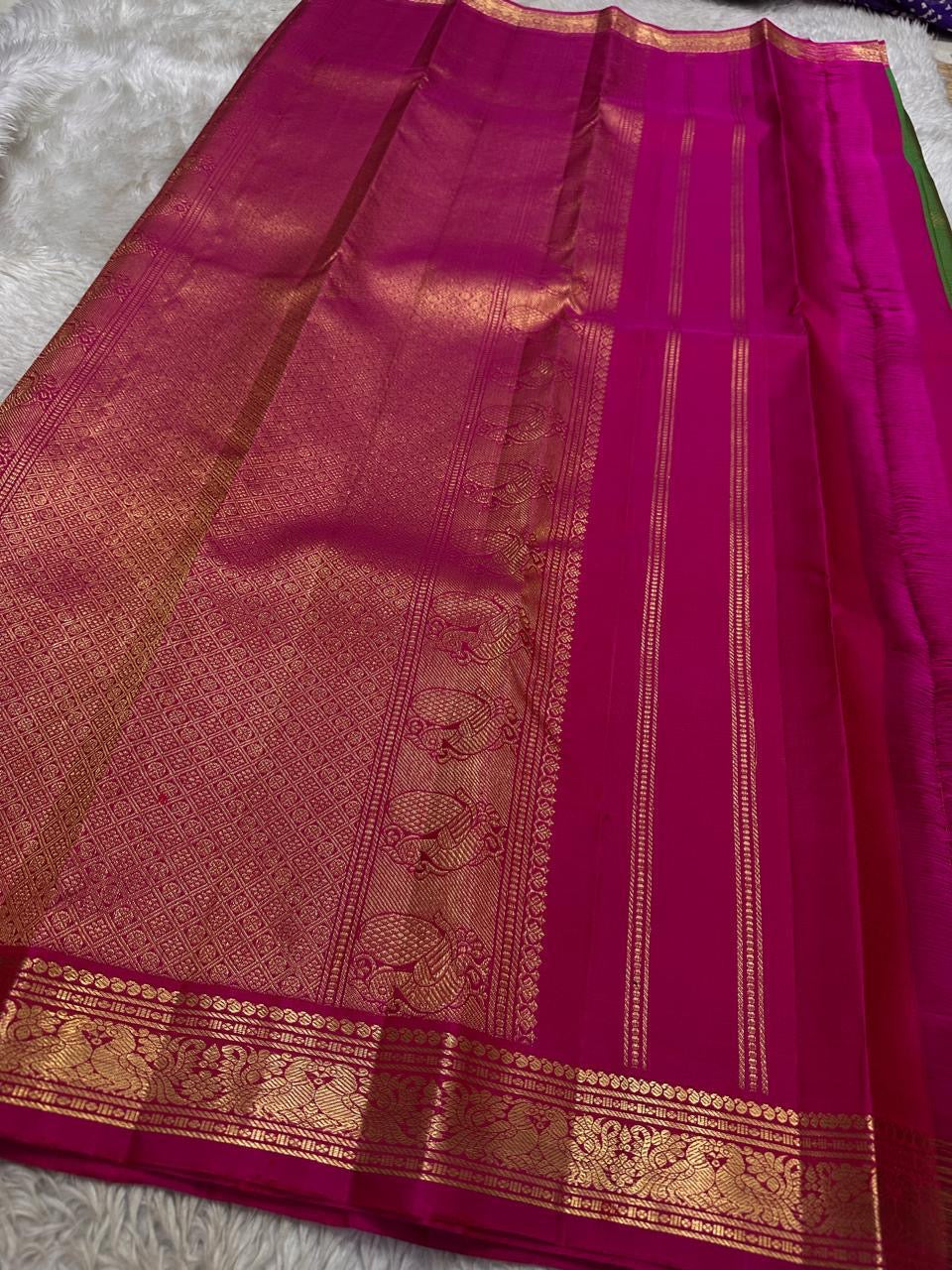 Full magenta pallu with zari woven detailing and motif panel on pure Kanchipuram silk saree, shipped from New Jersey USA.