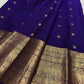 Traditional Kanchipuram saree in regal indigo blue with temple-inspired Yazhi motif weaving