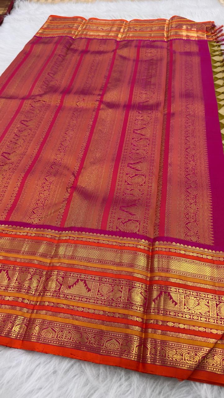 Rani Pink orange and gold Varisaipet border on Muted Olive Gold pure silk Kanchipuram saree.