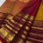 Detailed view of traditional Yaanai motifs arranged between horizontal gold zari bands on an Arakku border.