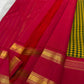Festive Kanchipuram silk saree yellow green kattam body with brick red rettapet border flatlay Idam Living