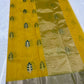Handwoven pure silk Chanderi saree in turmeric yellow with traditional motifs