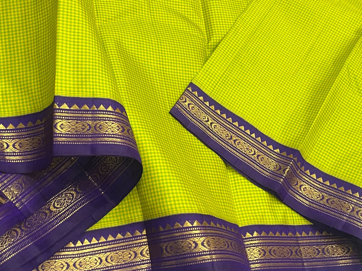 Lime-green Kanchi Kattam silk saree with minute checks and a deep purple gold zari border