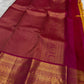 Floral creeper gold-zari work on the Sampangi Gold Kanchipuram Butta silk.