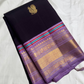 folded aubergine purple pure kanchipuram silk saree with gold zari woven butta and lavender border