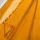 Close view of mustard Pure Kanchipuram Silk Saree with striped pallu section and tassels, shipped from New Jersey USA