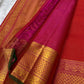 Pink pallu close-up with zari woven detailing and gold zari border on Kanchipuram silk saree