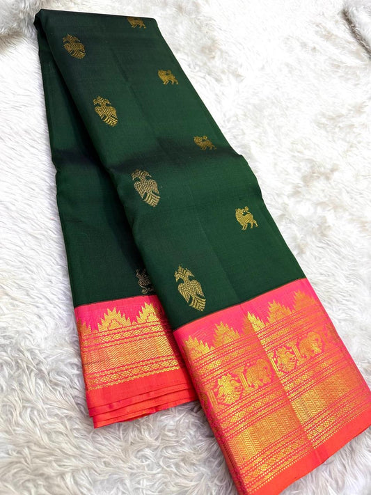Deep Forest Green Handwoven Pure Silk Kanjeevaram Saree with Gandaberunda Zari Buttas and Rani Pink Border