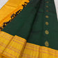 Deep forest-green pure silk body with spaced decorative zari buttas