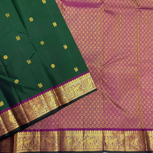 Mayil chakram and kamalam butta in gold zari on forest green Kanchipuram pure silk saree — Idam Living
