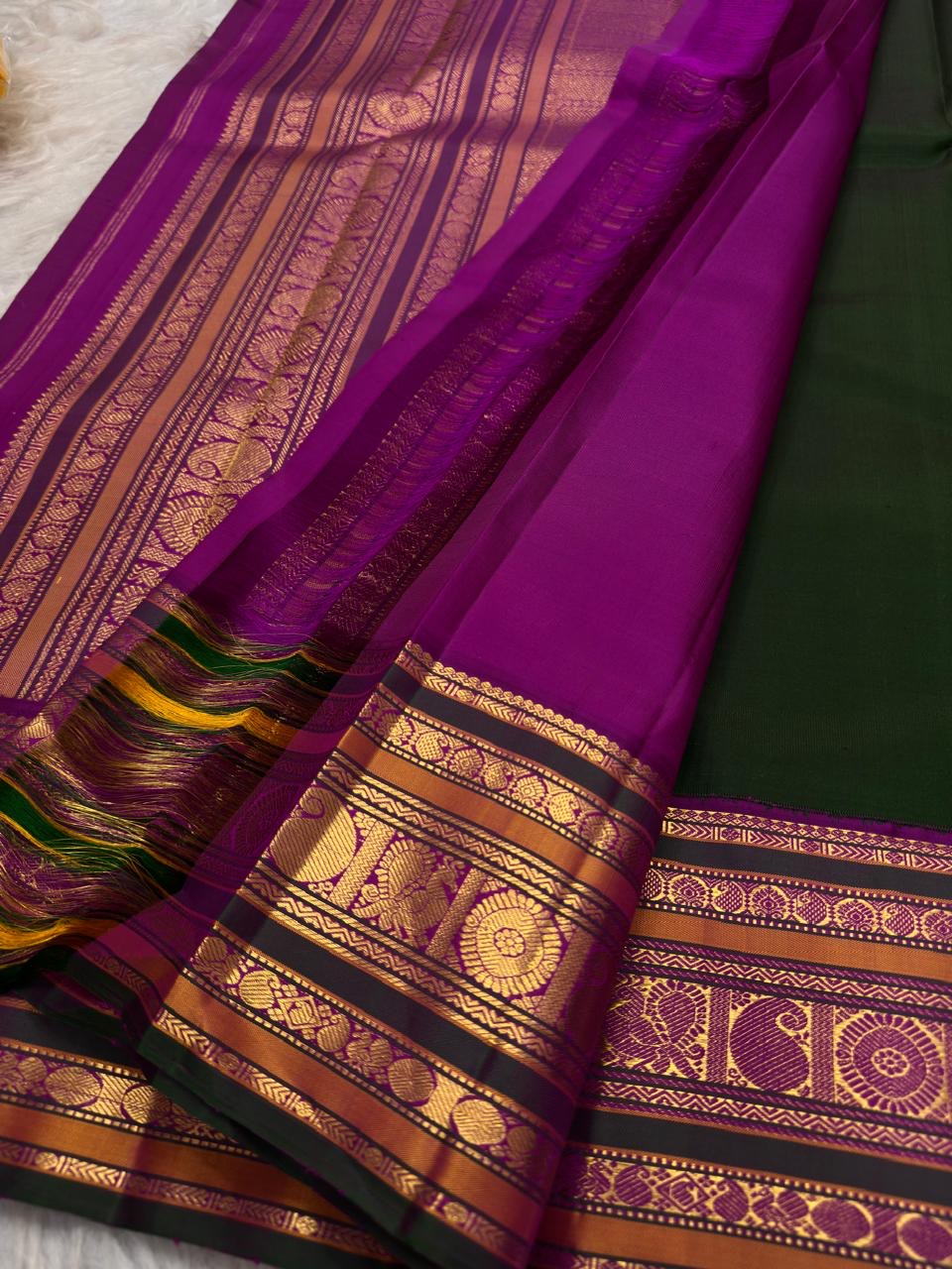 Stacked Varisaipet zari border showing Mayil Kann and Thazhampoo Reku patterns on green silk