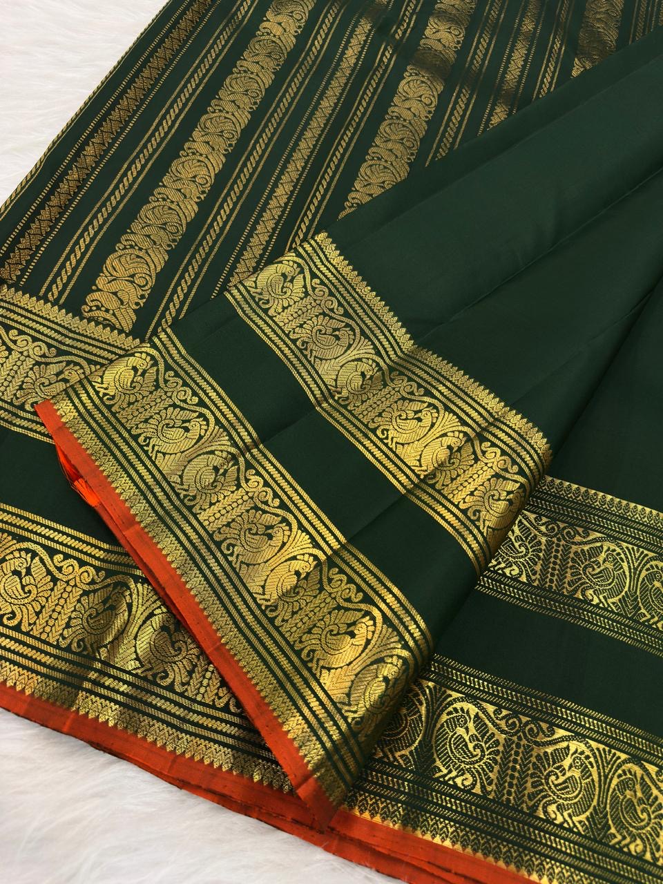 Deep Forest Green Handwoven Pure Silk Kanchipuram Saree with Rettapet Mayil Zari Border and Orange-Red Selvedge