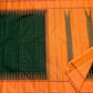 Orange pallu of forest green Kanjipuram pure silk saree with Thazhampoo Reku and Varisaipet antique gold zari cascade