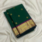 Butta close-up in gold zari on forest green Kancheepuram pure silk saree — Idam Living